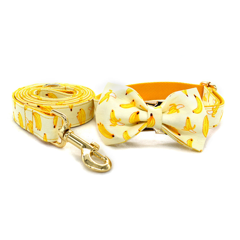 Yellow Banana Dog Traction Rope set featuring a collar with bow and matching leash designed for dogs.